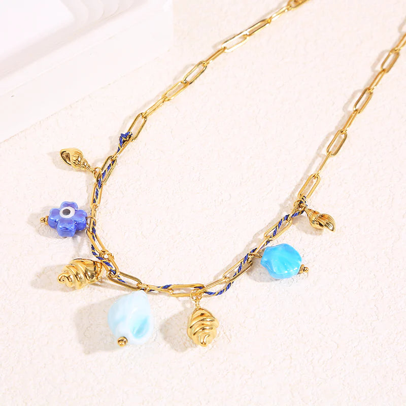 Collier Acier inoxydable doré femme et tissu bleu Coraya