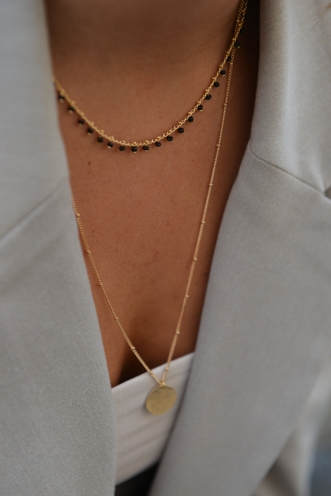 Collier plaqué or double & perles de Miyuki noire Calvi